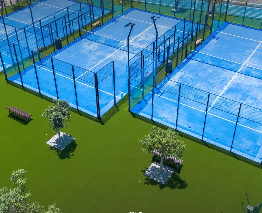 Aerial view of the padel courts and gardens